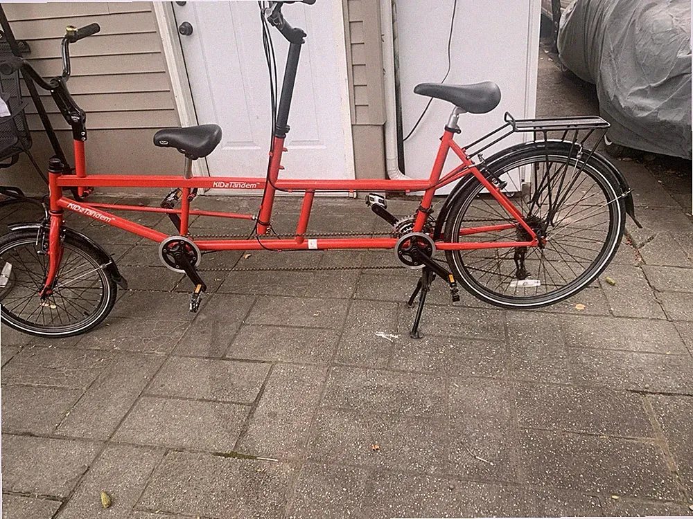 KIDZ AND ADULT TANDEM BIKE RED RARE I BOUGHT BRAND NEW BUT MY LITTLE GIRL SHE DO
